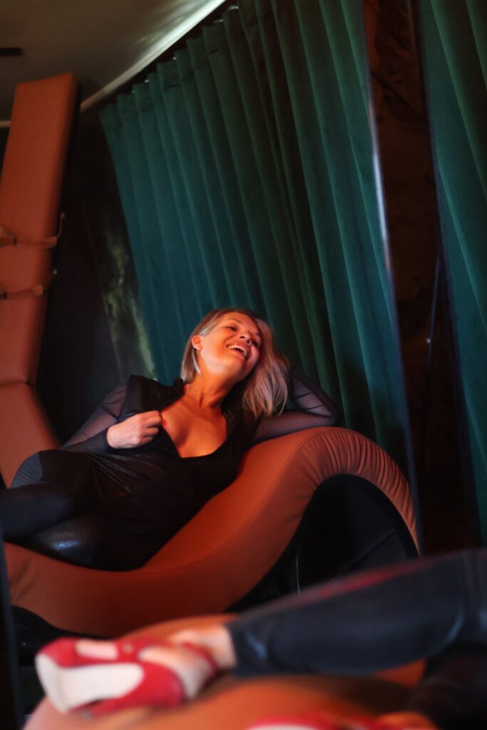 Relaxing in the private playroom at Naughty by Nature